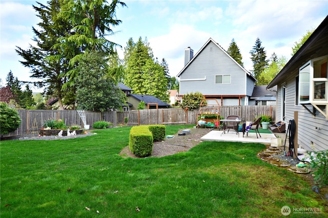 view of yard featuring a fenced backyard and a patio area