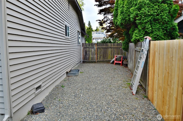 view of yard with fence