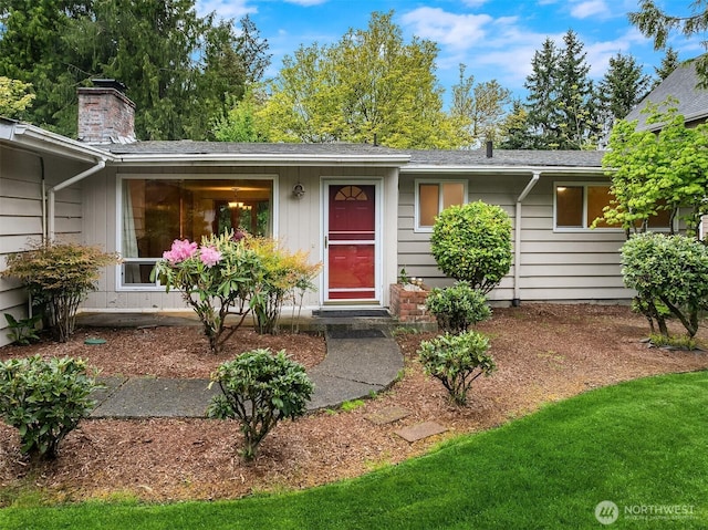 10210 NE 23rd St, Bellevue, WA 98004 - property entrance featuring roof with shingles and a chimney