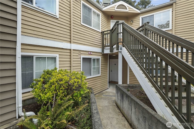 doorway to property with a wooden deck