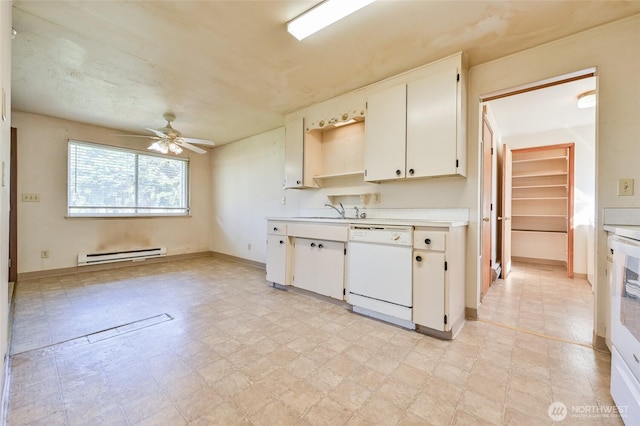 kitchen featuring a sink, dishwasher, light floors, a ceiling fan, and a baseboard radiator