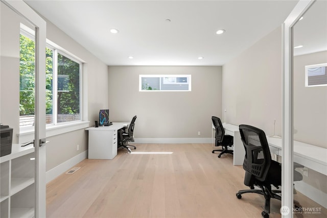 home office featuring light wood-type flooring, baseboards, and recessed lighting