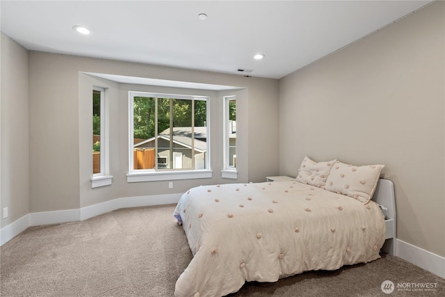 bedroom featuring carpet floors, baseboards, and recessed lighting
