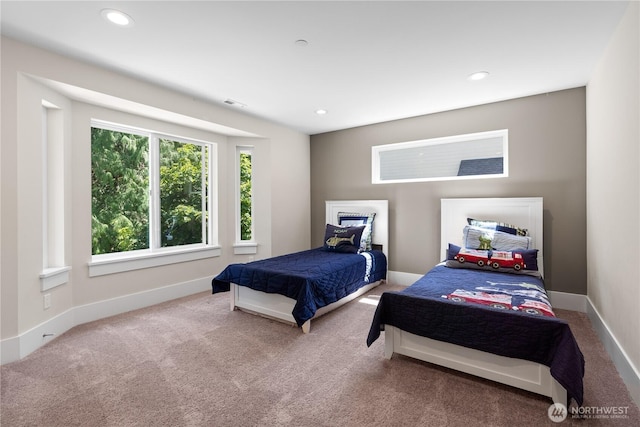 bedroom featuring carpet floors, recessed lighting, and baseboards