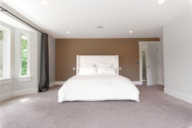 bedroom with carpet, recessed lighting, and baseboards