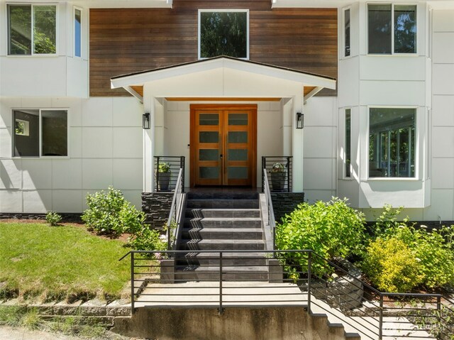 16831 84th Ln NE, Kenmore, WA 98028 - property entrance featuring a porch and stucco siding