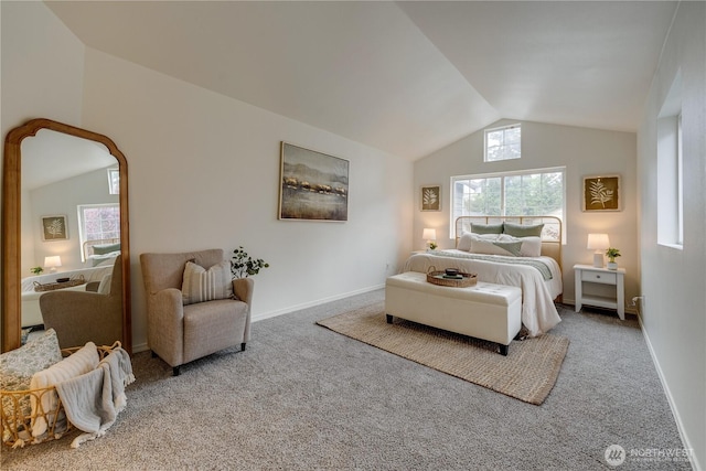 bedroom with baseboards, carpet flooring, and lofted ceiling