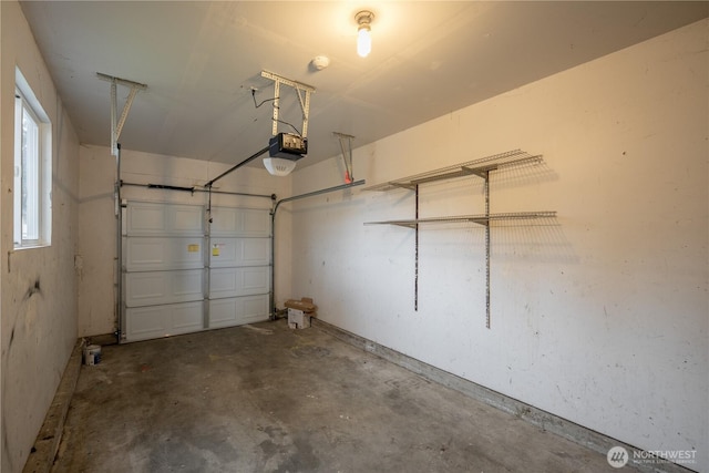 garage featuring a garage door opener