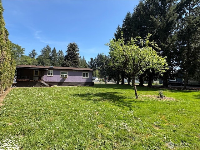 view of yard featuring a deck