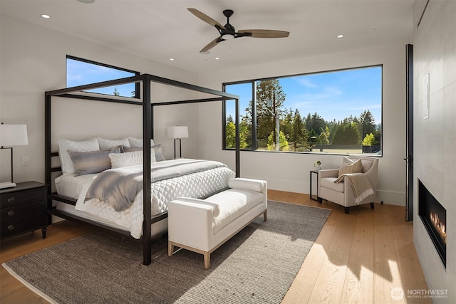 1032 89th Ave NE, Bellevue, WA 98004 - bedroom featuring recessed lighting, baseboards, ceiling fan, and hardwood / wood-style flooring