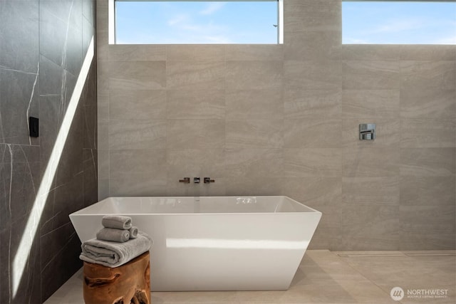 1032 89th Ave NE, Bellevue, WA 98004 - full bathroom featuring tile walls and a freestanding bath