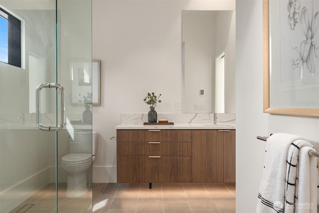 1032 89th Ave NE, Bellevue, WA 98004 - bathroom featuring vanity, toilet, tile patterned flooring, and a stall shower