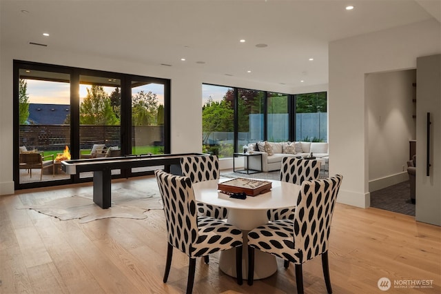 1032 89th Ave NE, Bellevue, WA 98004 - dining space featuring recessed lighting, light wood-style flooring, and baseboards