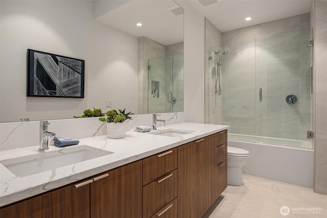 1032 89th Ave NE, Bellevue, WA 98004 - full bath featuring a sink, bath / shower combo with glass door, toilet, and double vanity