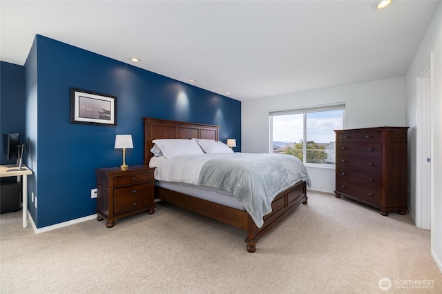 bedroom with baseboards, light carpet, and recessed lighting