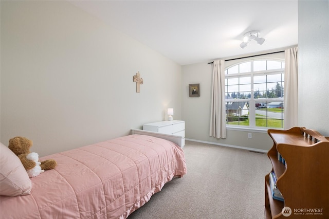 bedroom featuring baseboards, carpet, and visible vents