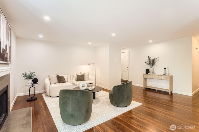 3018 128th Ave SE Unit 10, Bellevue, WA 98005 - living area with recessed lighting, baseboards, a fireplace with flush hearth, and wood finished floors