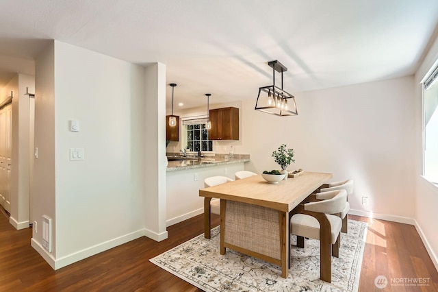 3018 128th Ave SE Unit 10, Bellevue, WA 98005 - dining space featuring baseboards, visible vents, and dark wood-style floors
