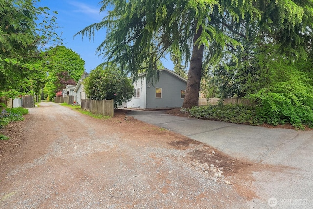 110 NW 110th St, Seattle, WA 98177 - view of home's exterior with fence and driveway