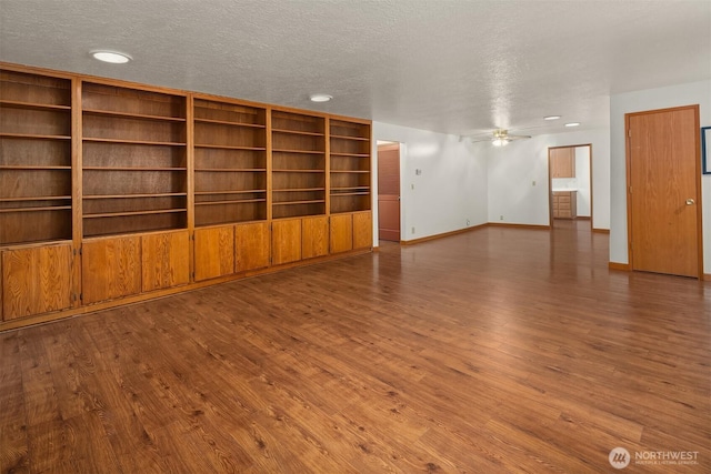 110 NW 110th St, Seattle, WA 98177 - spare room featuring baseboards, a textured ceiling, ceiling fan, and wood finished floors
