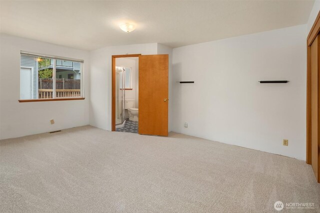 110 NW 110th St, Seattle, WA 98177 - unfurnished bedroom with carpet, connected bathroom, and visible vents