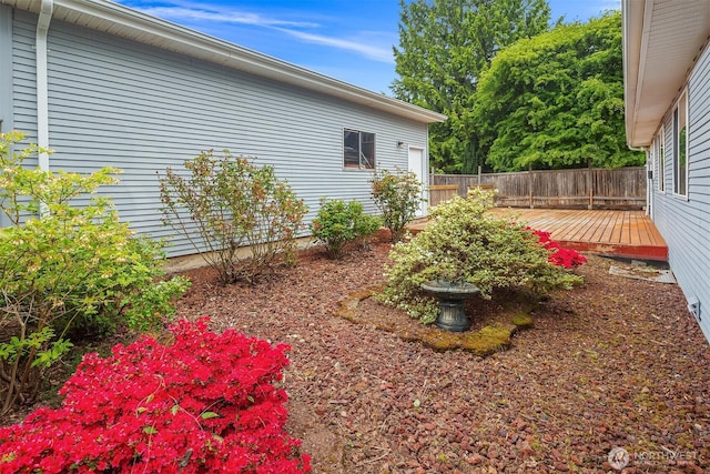 110 NW 110th St, Seattle, WA 98177 - view of yard with a deck and fence