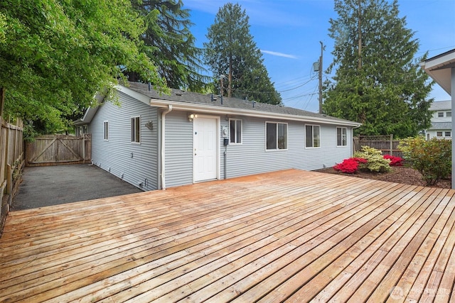 110 NW 110th St, Seattle, WA 98177 - wooden terrace featuring a fenced backyard and a gate