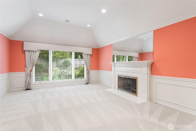 4799 171st Ave SE, Bellevue, WA 98006 - unfurnished living room featuring wainscoting, lofted ceiling, and a wealth of natural light