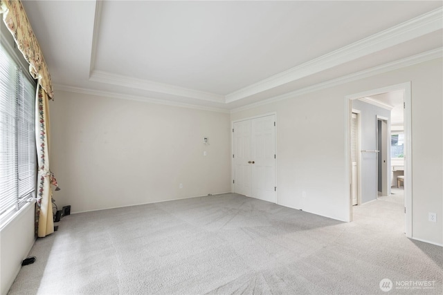 4799 171st Ave SE, Bellevue, WA 98006 - empty room with crown molding, light colored carpet, and a raised ceiling