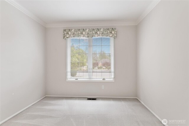 4799 171st Ave SE, Bellevue, WA 98006 - spare room featuring visible vents, ornamental molding, and carpet flooring