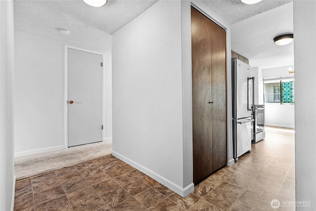 1346 Orleans, Bellingham, WA 98229 - corridor with a textured ceiling and baseboards