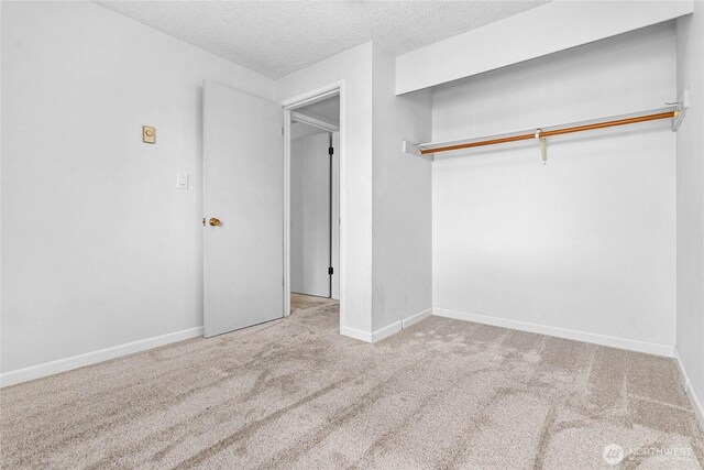 1346 Orleans, Bellingham, WA 98229 - unfurnished bedroom with carpet flooring, a textured ceiling, and baseboards