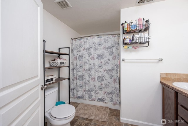 bathroom with a shower with curtain, vanity, toilet, and visible vents