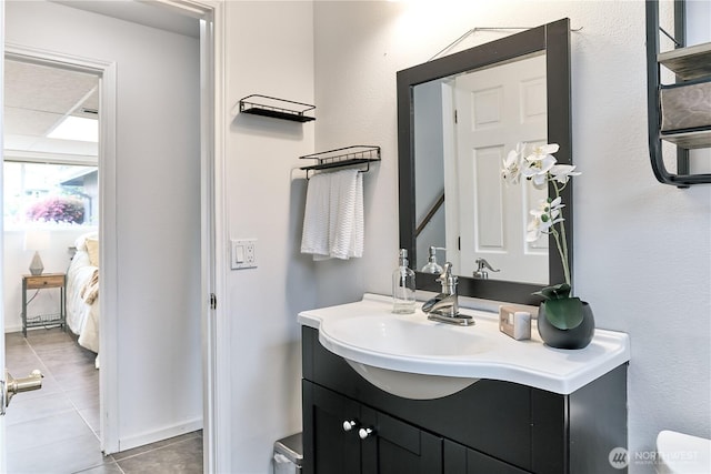 15722 62nd Pl NE, Kenmore, WA 98028 - bathroom featuring tile patterned flooring, vanity, and ensuite bath