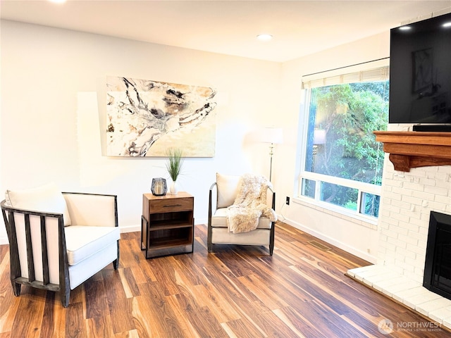 15722 62nd Pl NE, Kenmore, WA 98028 - living area with a fireplace, wood finished floors, and recessed lighting