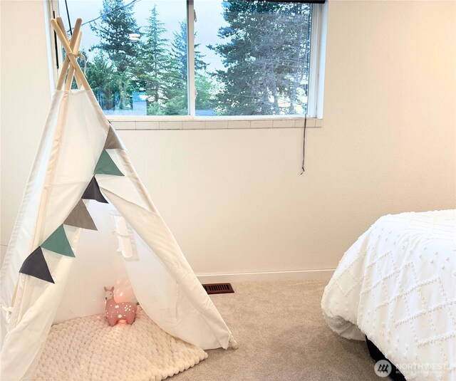 15722 62nd Pl NE, Kenmore, WA 98028 - carpeted bedroom featuring baseboards