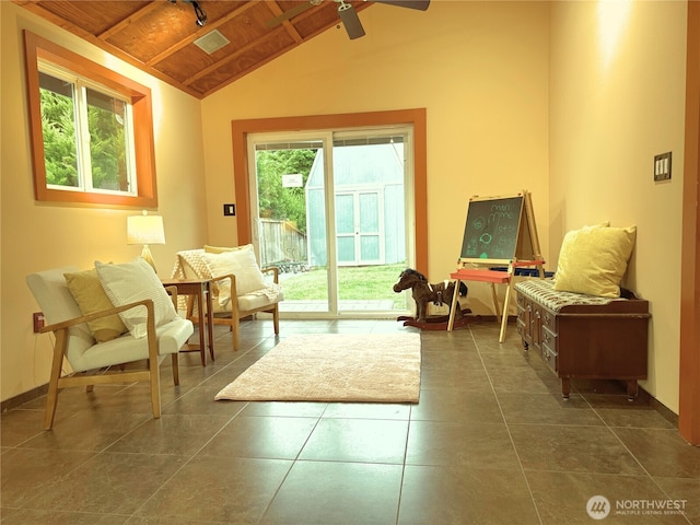 15722 62nd Pl NE, Kenmore, WA 98028 - living area featuring wood ceiling, a ceiling fan, and dark tile patterned flooring