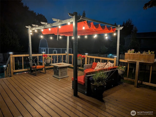 15722 62nd Pl NE, Kenmore, WA 98028 - deck at night with an outdoor living space with a fire pit
