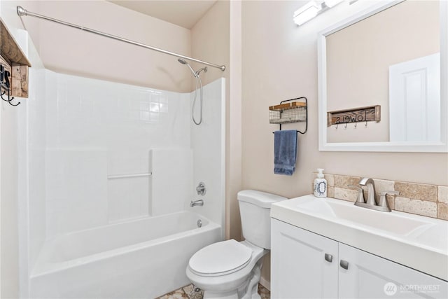 full bathroom with toilet, washtub / shower combination, and vanity