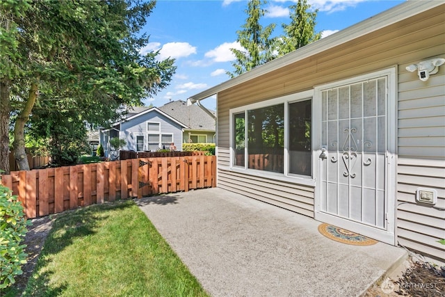 exterior space featuring a gate and fence