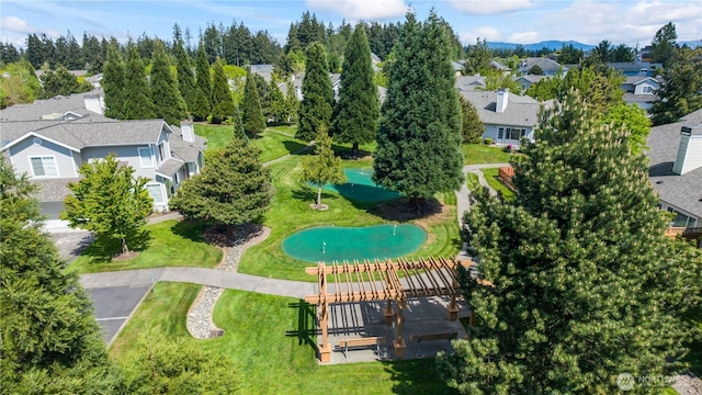 birds eye view of property with a residential view