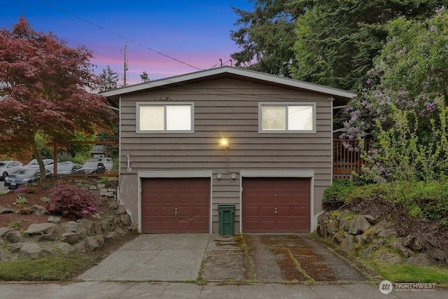garage featuring driveway