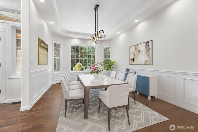 23615 38th Ave E, Spanaway, WA 98387 - dining space featuring recessed lighting, a chandelier, a decorative wall, wood finished floors, and a wainscoted wall