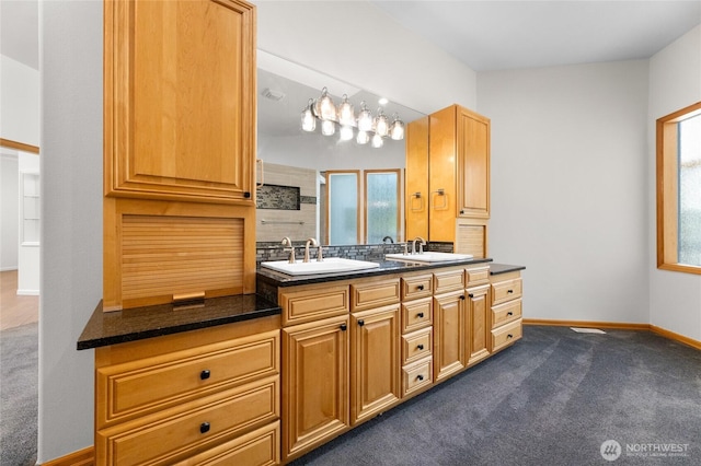 23615 38th Ave E, Spanaway, WA 98387 - bathroom with double vanity and baseboards