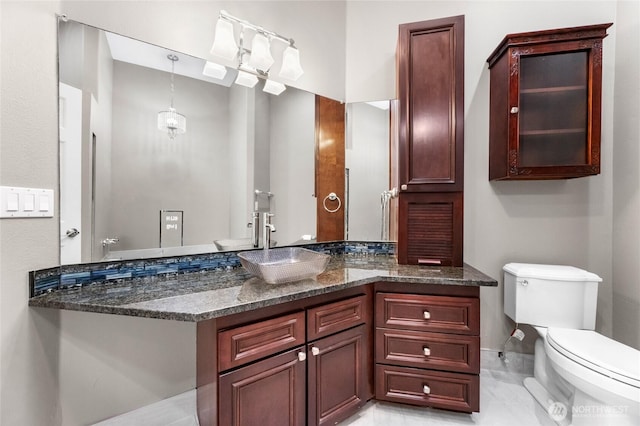 23615 38th Ave E, Spanaway, WA 98387 - bathroom featuring toilet and vanity
