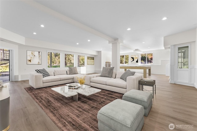 23615 38th Ave E, Spanaway, WA 98387 - living area featuring light wood-style flooring, recessed lighting, and ornate columns