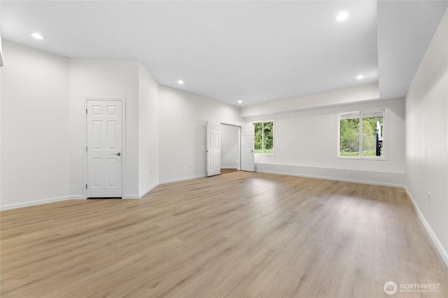 23615 38th Ave E, Spanaway, WA 98387 - unfurnished room featuring light wood finished floors, recessed lighting, and baseboards