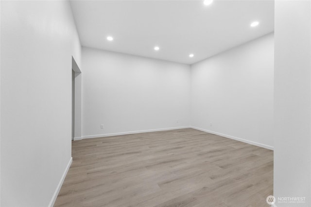 23615 38th Ave E, Spanaway, WA 98387 - spare room with recessed lighting, wood finished floors, and baseboards