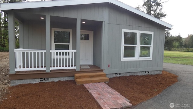 exterior space featuring covered porch