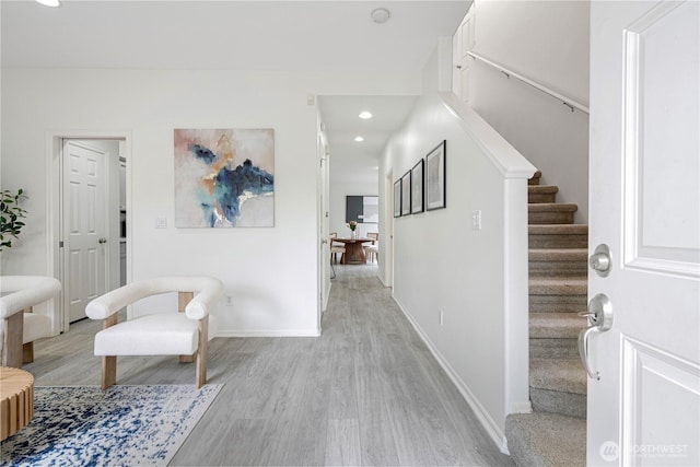 1741 12th Ave NE, Issaquah, WA 98029 - hallway featuring light wood-style floors, recessed lighting, stairs, and baseboards